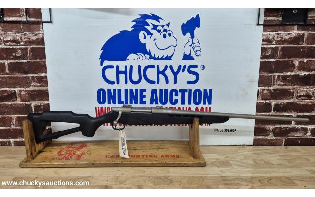 LOT 813 MOSSBERG 4X4 338WM FU579